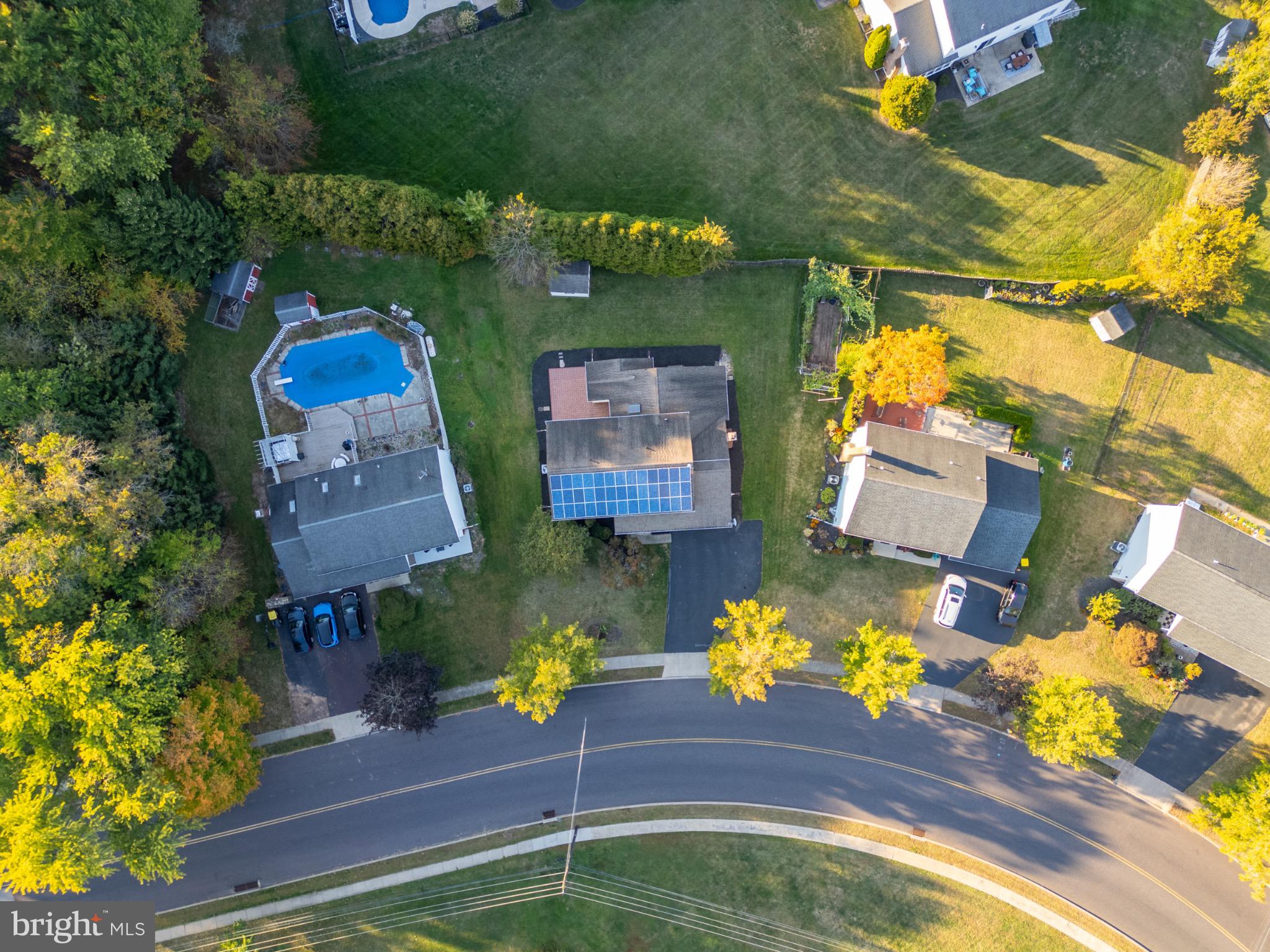 1520 Fairgrounds Road Hatfield, PA 19440 - Photo 7 of 52 Charming neighborhood with vibrant greenery.
