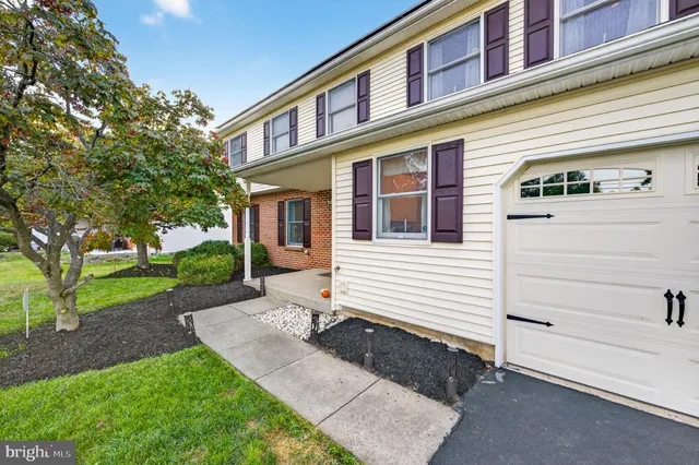 a view of a brick house with a door