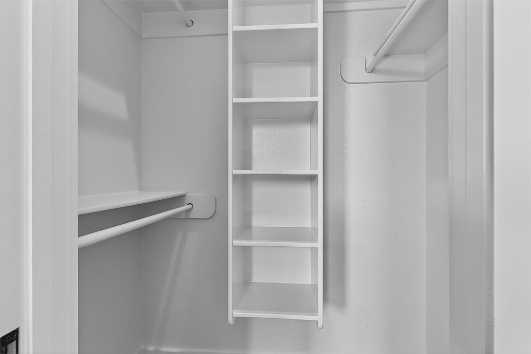 232 Nautilus Port Aransas, TX 78373 - Photo 20 of 28 a view of walk in closet with empty racks