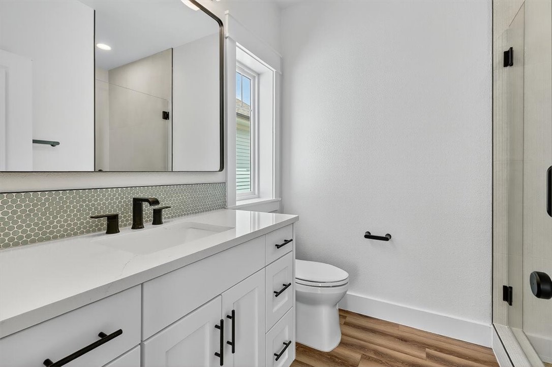 232 Nautilus Port Aransas, TX 78373 - Photo 24 of 28 a bathroom with a sink and a mirror