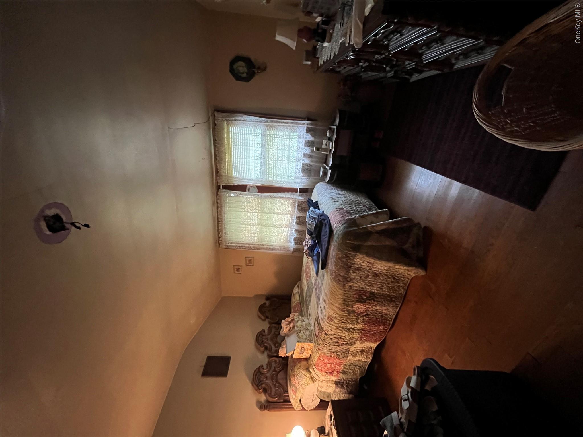 35 Spring Street Goshen, NY 10924 - Photo 19 of 26 a bedroom with a bed and a window