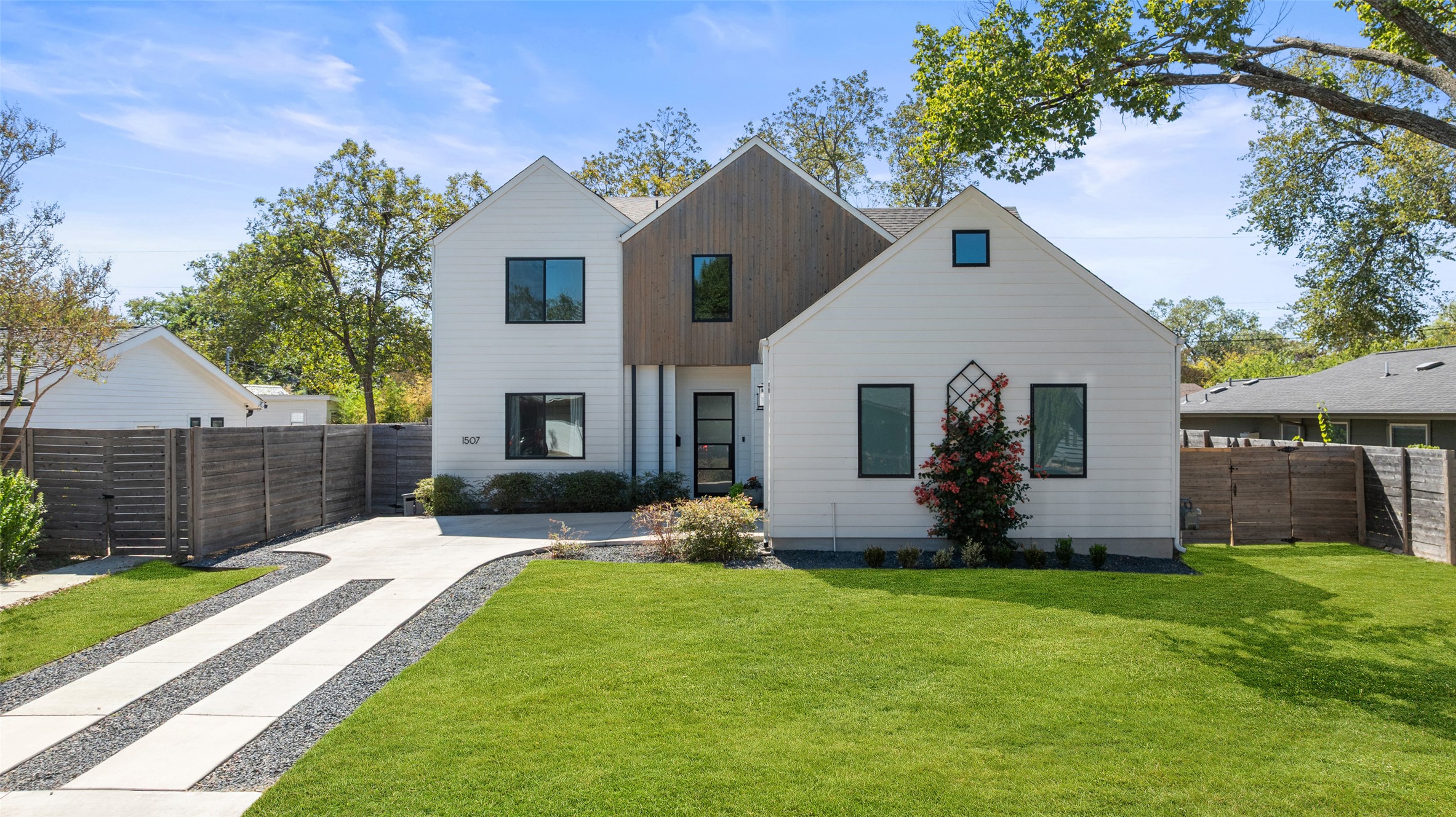 1507 Villanova Drive Austin, TX 78757 - Photo 1 of 1 a front view of house with yard and green space