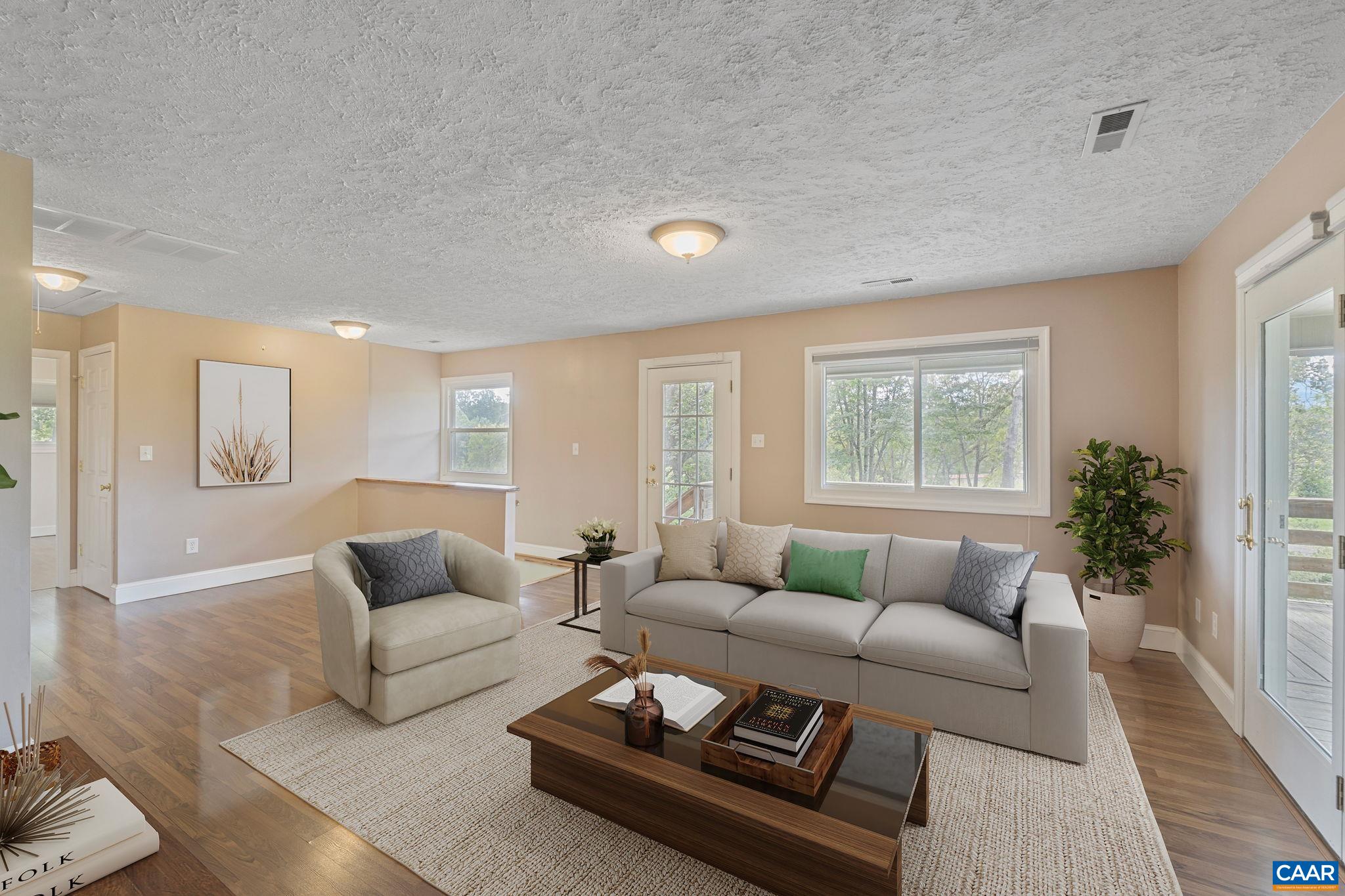 8508 Dick Woods Road Afton, VA 22920 - Photo 12 of 55 a living room with furniture and a large window