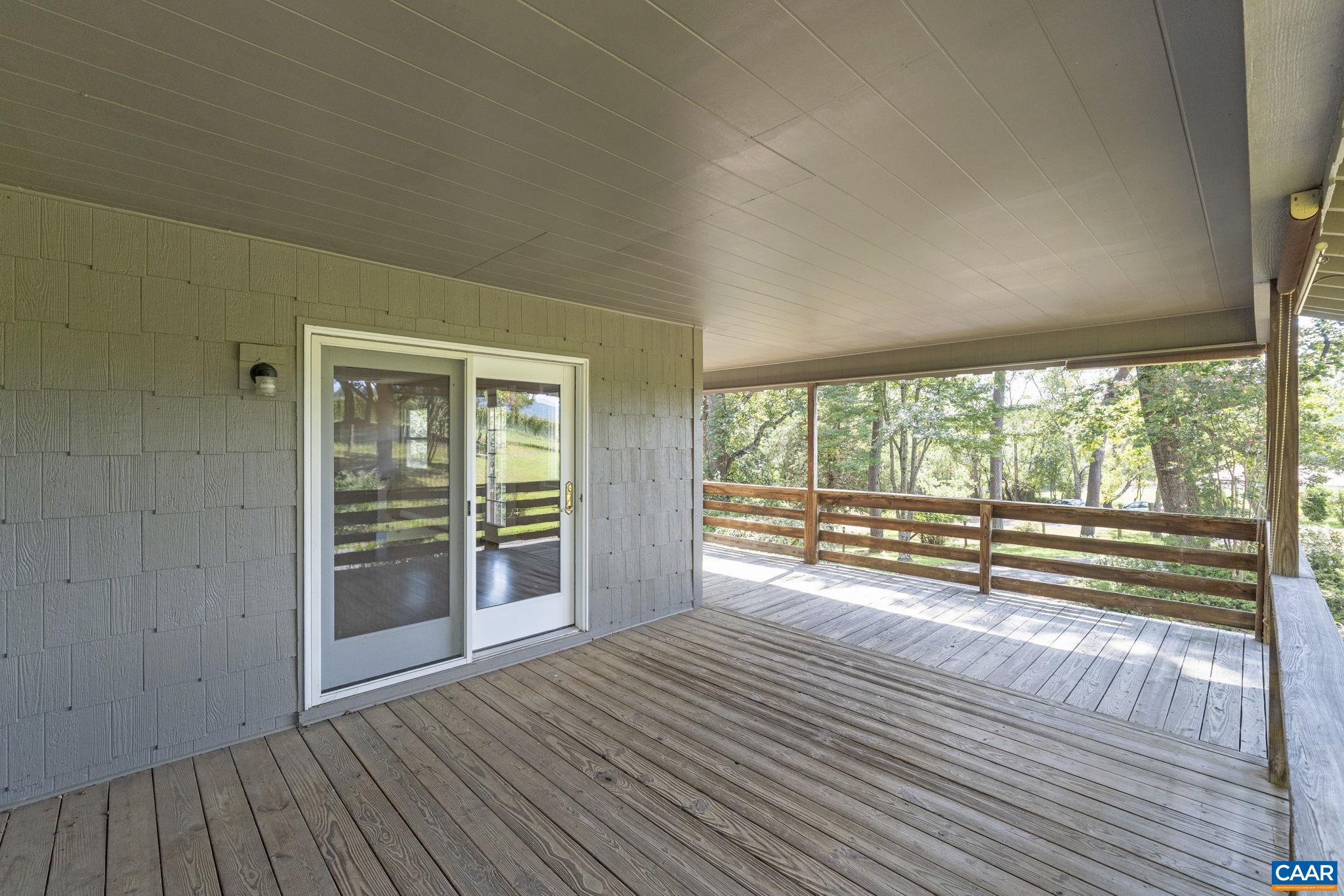 8508 Dick Woods Road Afton, VA 22920 - Photo 3 of 55 an empty room with wooden floor and windows