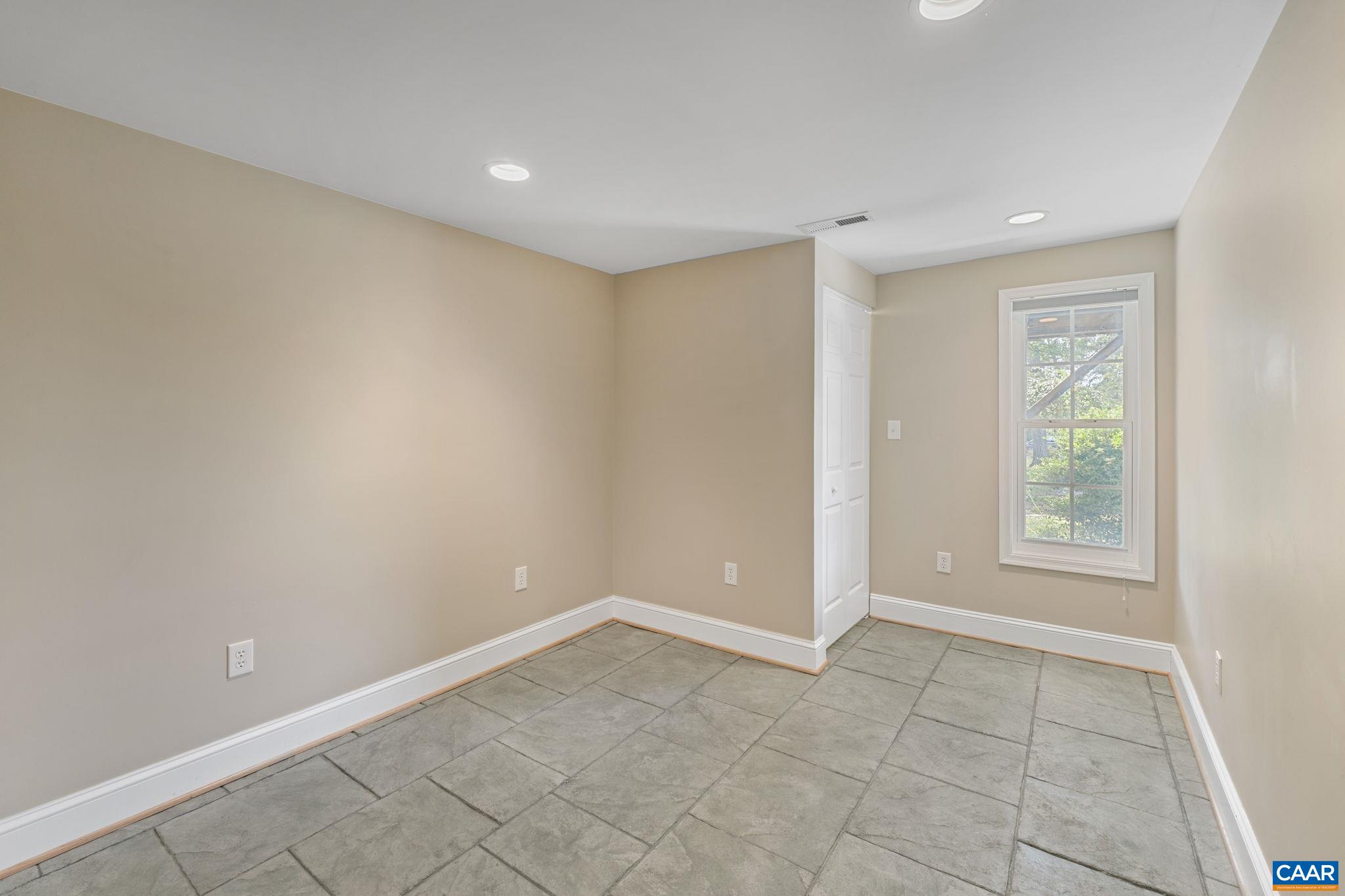 8508 Dick Woods Road Afton, VA 22920 - Photo 38 of 55 an empty room with a empty space and a window
