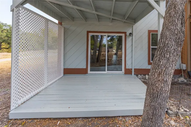 a view of backyard with seating space