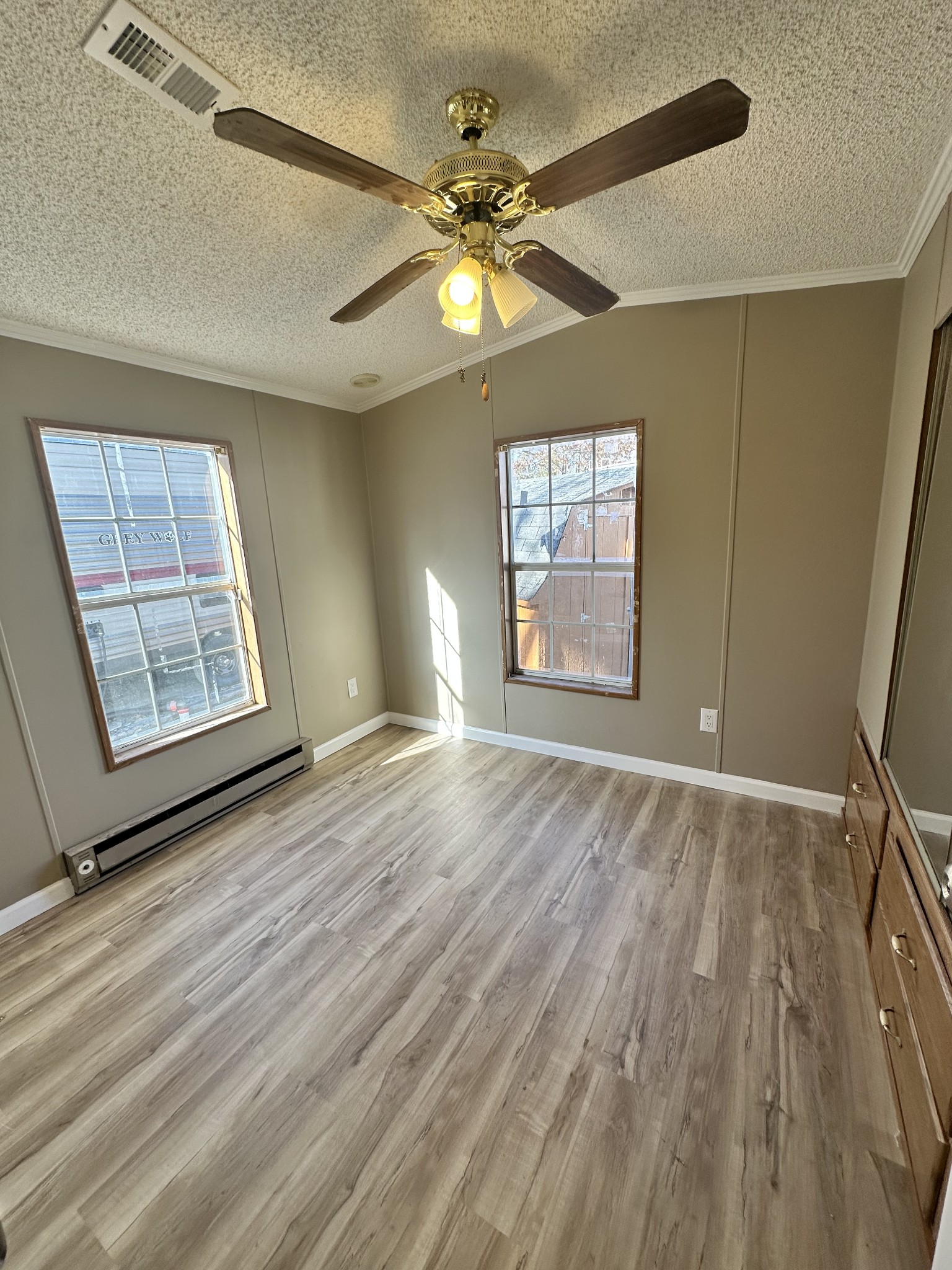 69 Apache Trail Crossville, TN 38572 - Photo 5 of 9 wooden floor in an empty room with a window