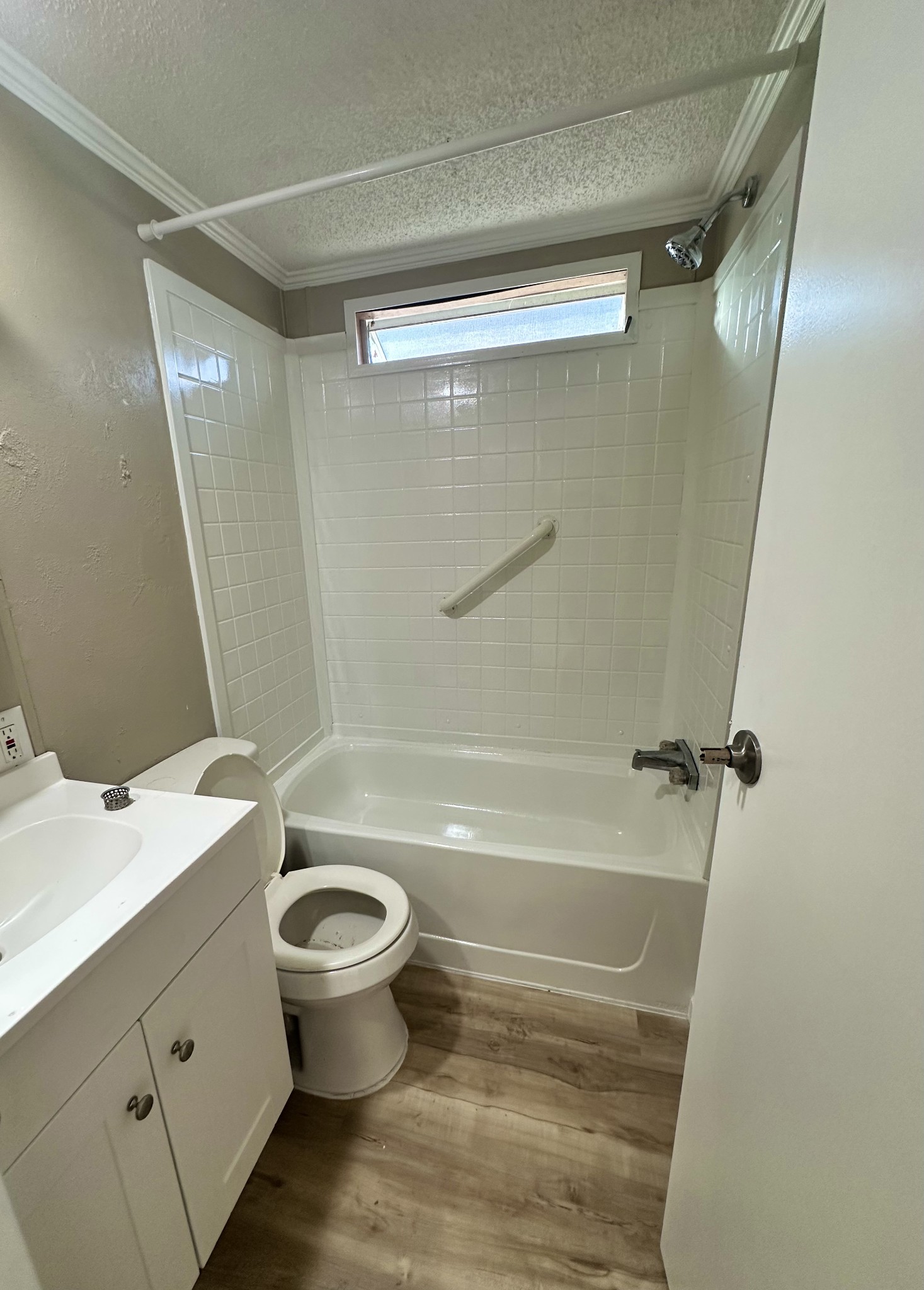 69 Apache Trail Crossville, TN 38572 - Photo 6 of 9 a bathroom with a double vanity sink toilet mirror and shower