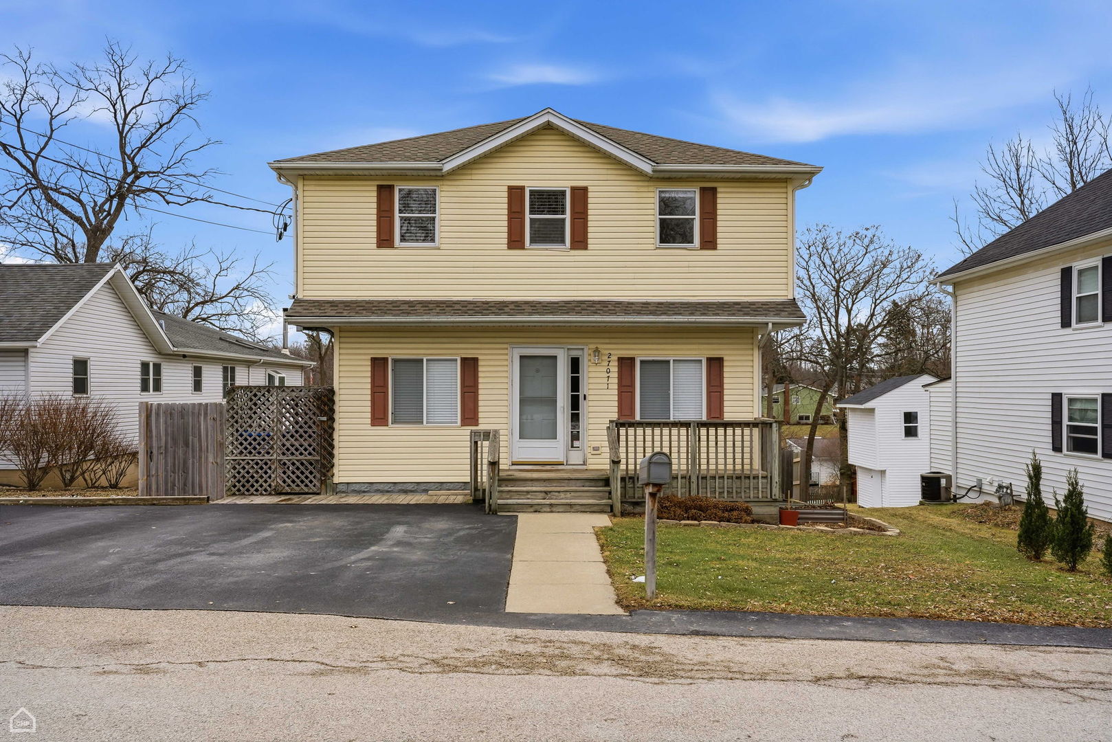 27071 North Ridge Street Wauconda, IL 60084 - Photo 1 of 36 a front view of a house with a yard