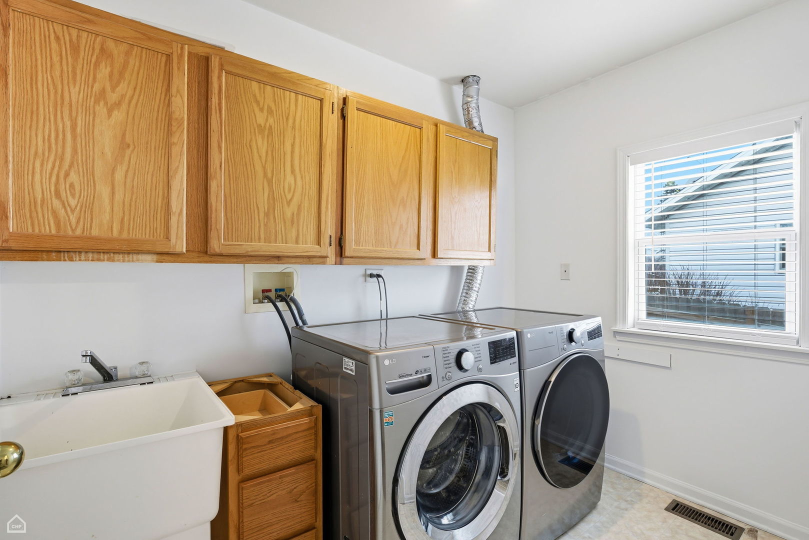 27071 North Ridge Street Wauconda, IL 60084 - Photo 14 of 36 a utility room with dryer and washer