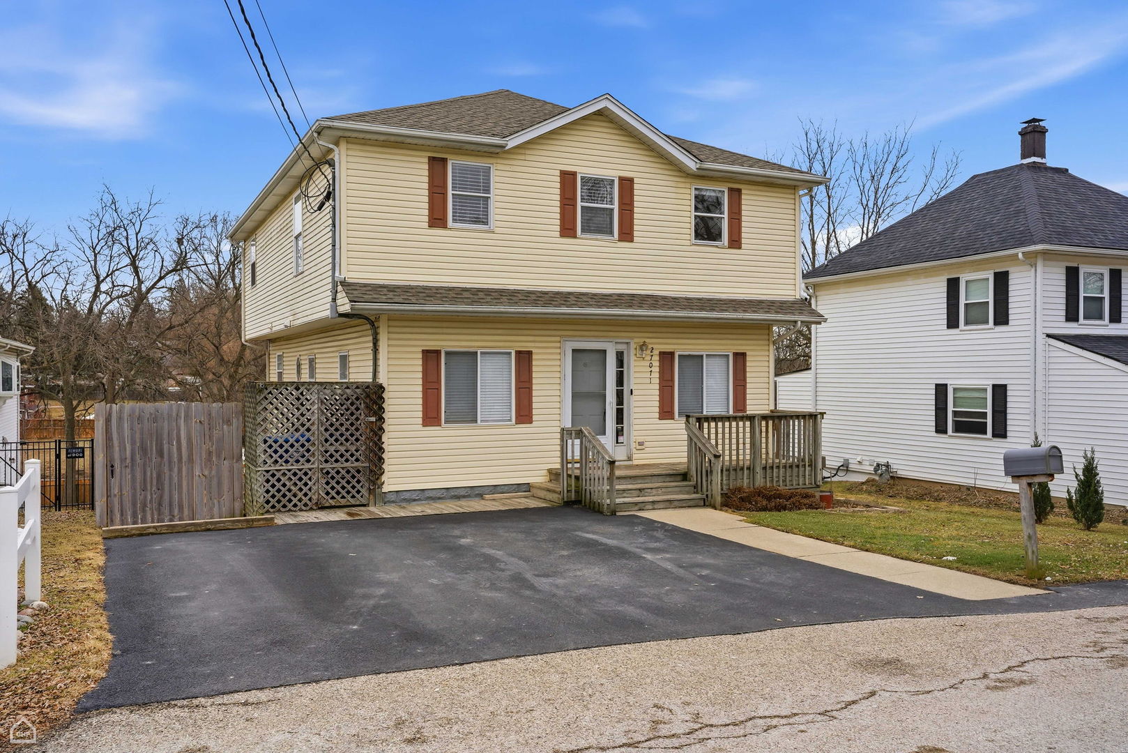 27071 North Ridge Street Wauconda, IL 60084 - Photo 27 of 36 a front view of a house with a yard