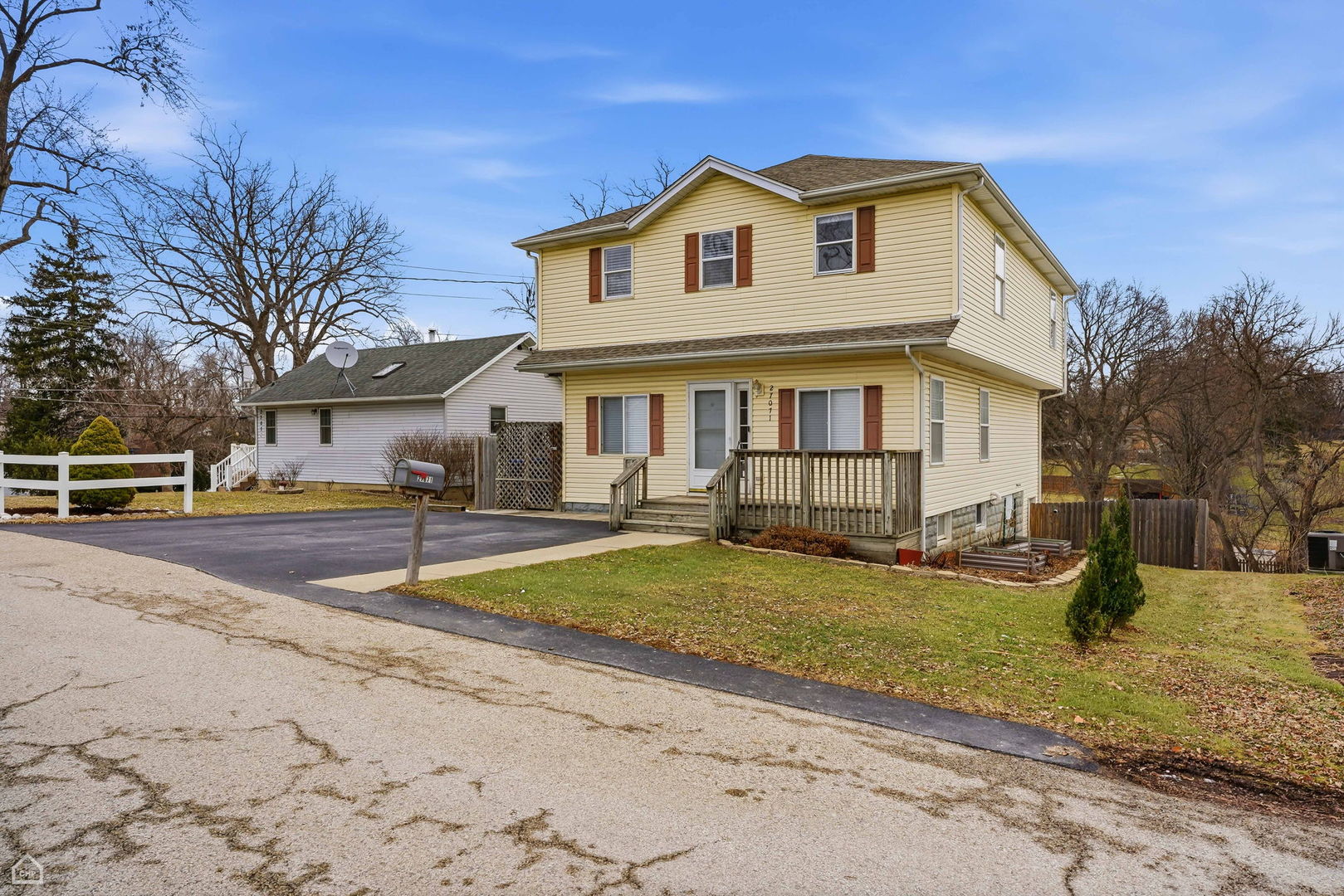 27071 North Ridge Street Wauconda, IL 60084 - Photo 28 of 36 a view of a house with a yard and large tree