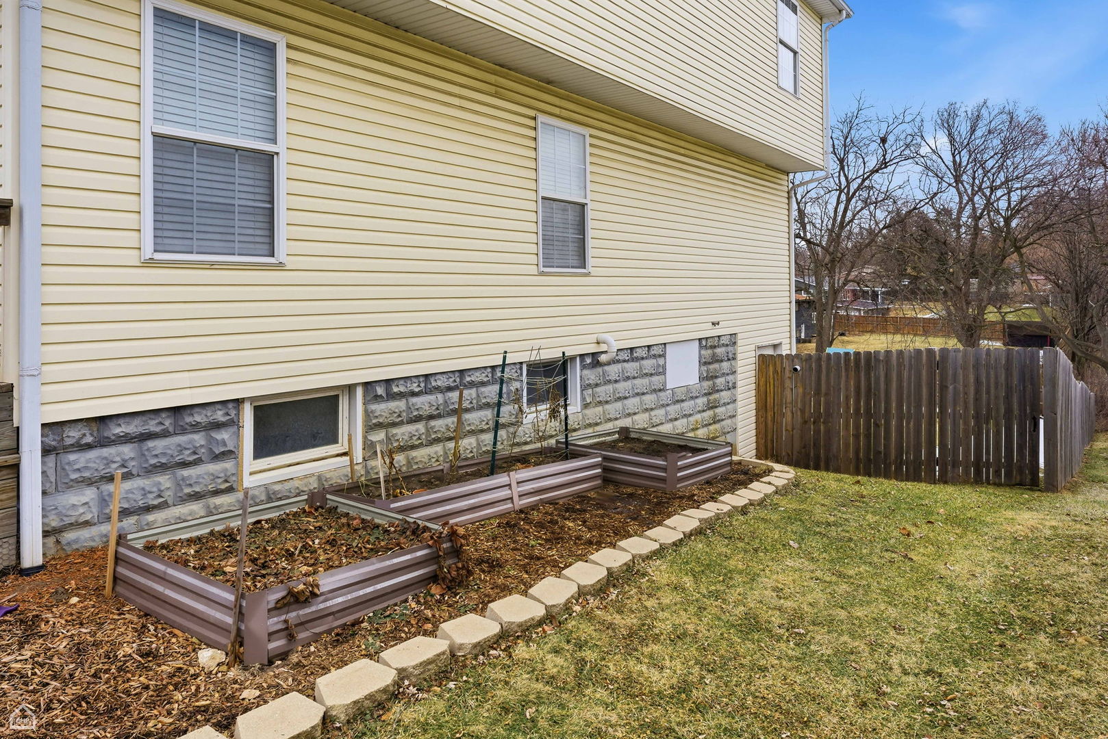 27071 North Ridge Street Wauconda, IL 60084 - Photo 29 of 36 a front view of a house with a fence