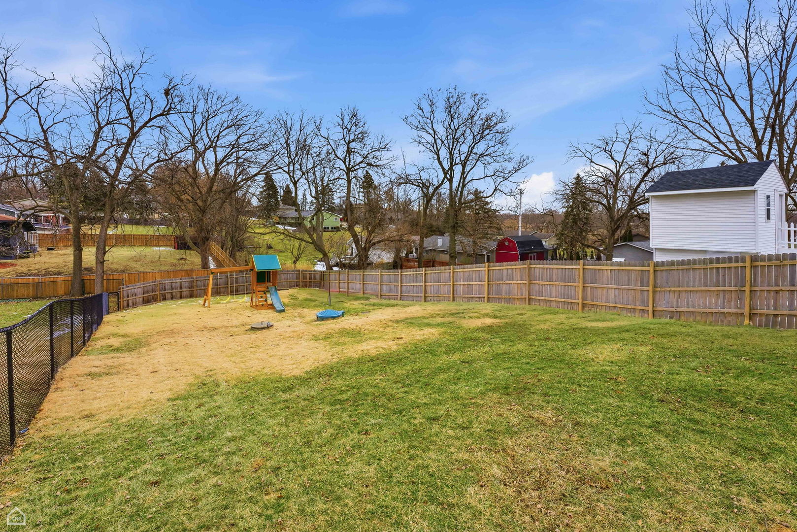 27071 North Ridge Street Wauconda, IL 60084 - Photo 32 of 36 a view of yard with swimming pool and trees
