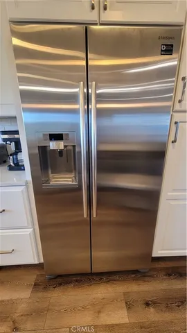 a very nice looking dining room with a table and chairs