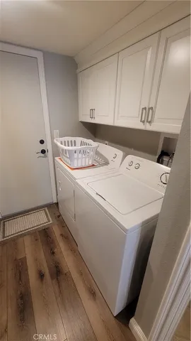 a bedroom with a bed and a ceiling fan