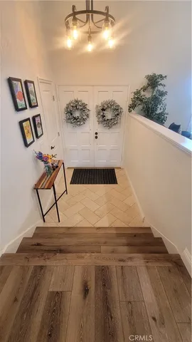 a view of staircase with white walls