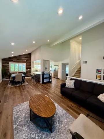 a living room with furniture and a couch