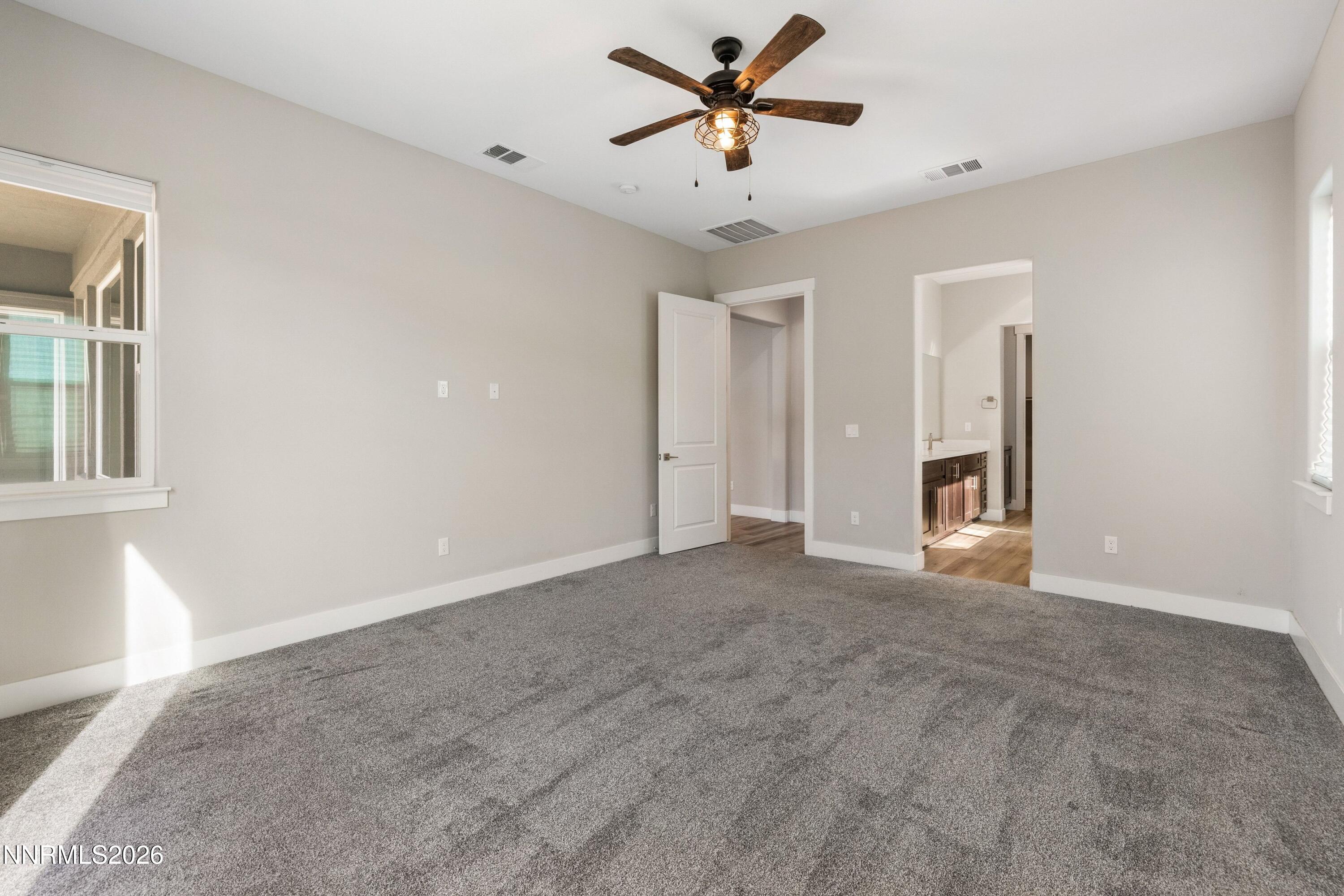 250 Commodore Drive Verdi, NV 89439 - Photo 19 of 49 a view of a livingroom with a ceiling fan and window