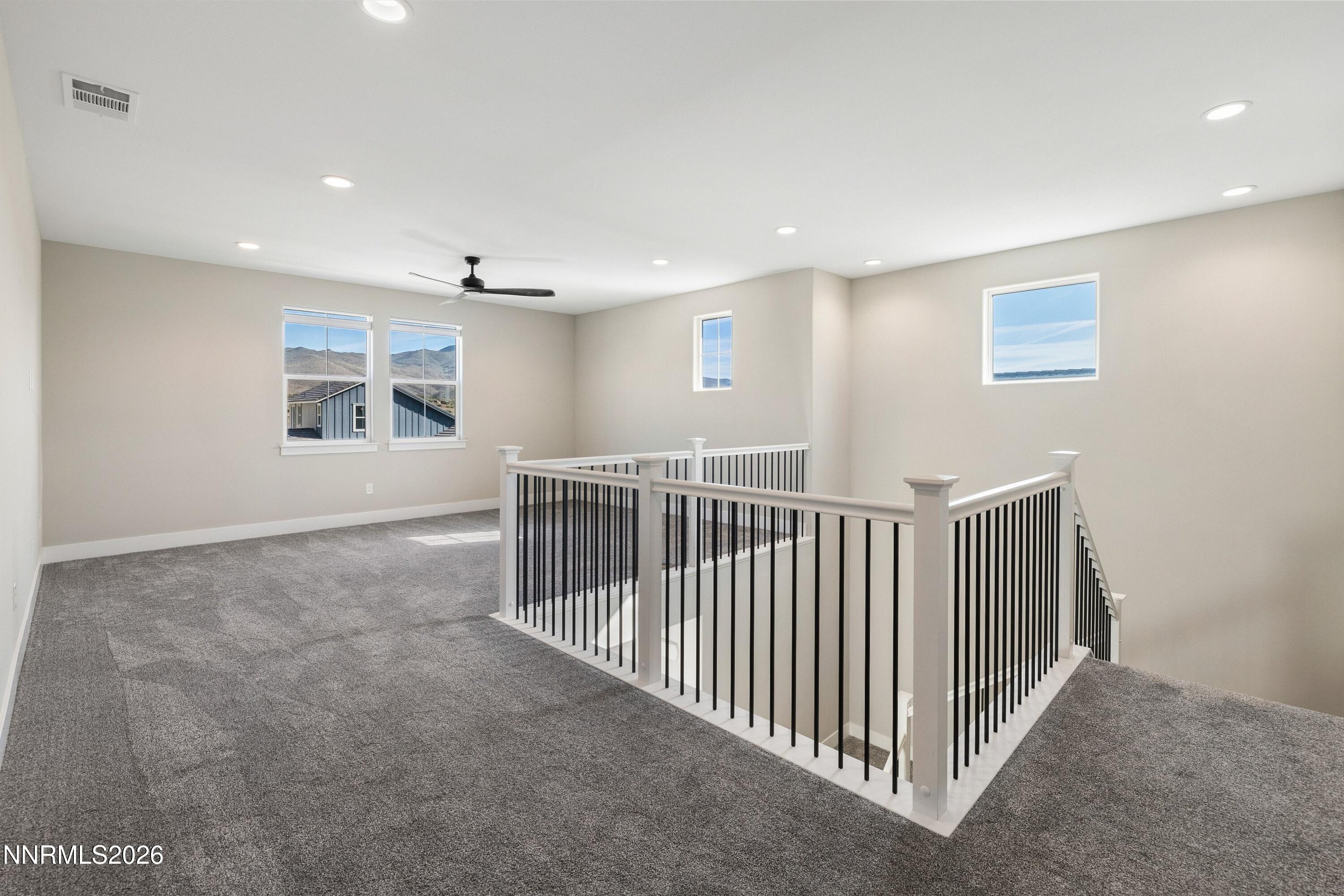 250 Commodore Drive Verdi, NV 89439 - Photo 22 of 49 a view of a hallway with window