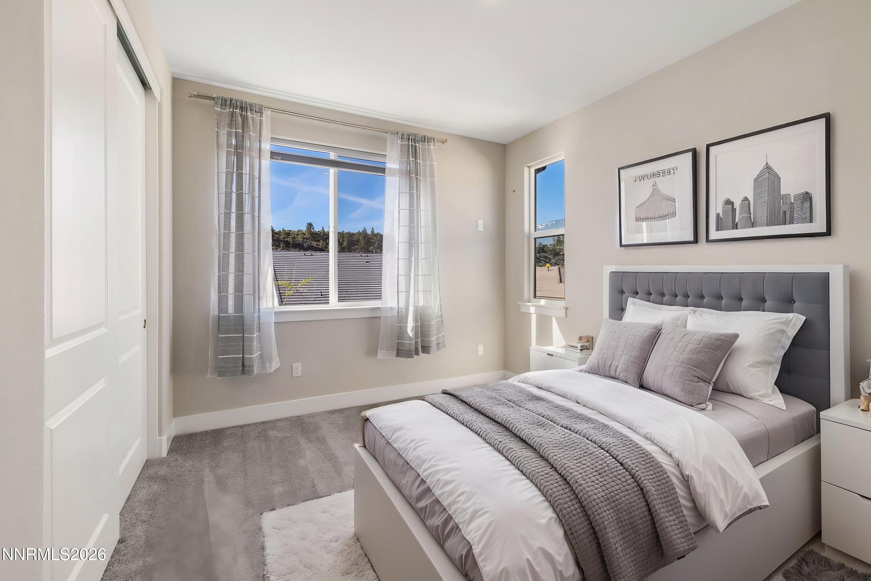 250 Commodore Drive Verdi, NV 89439 - Photo 8 of 49 a bedroom with a large bed and a window