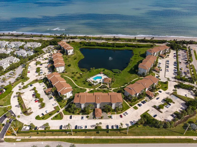 a view of swimming pool with outdoor seating