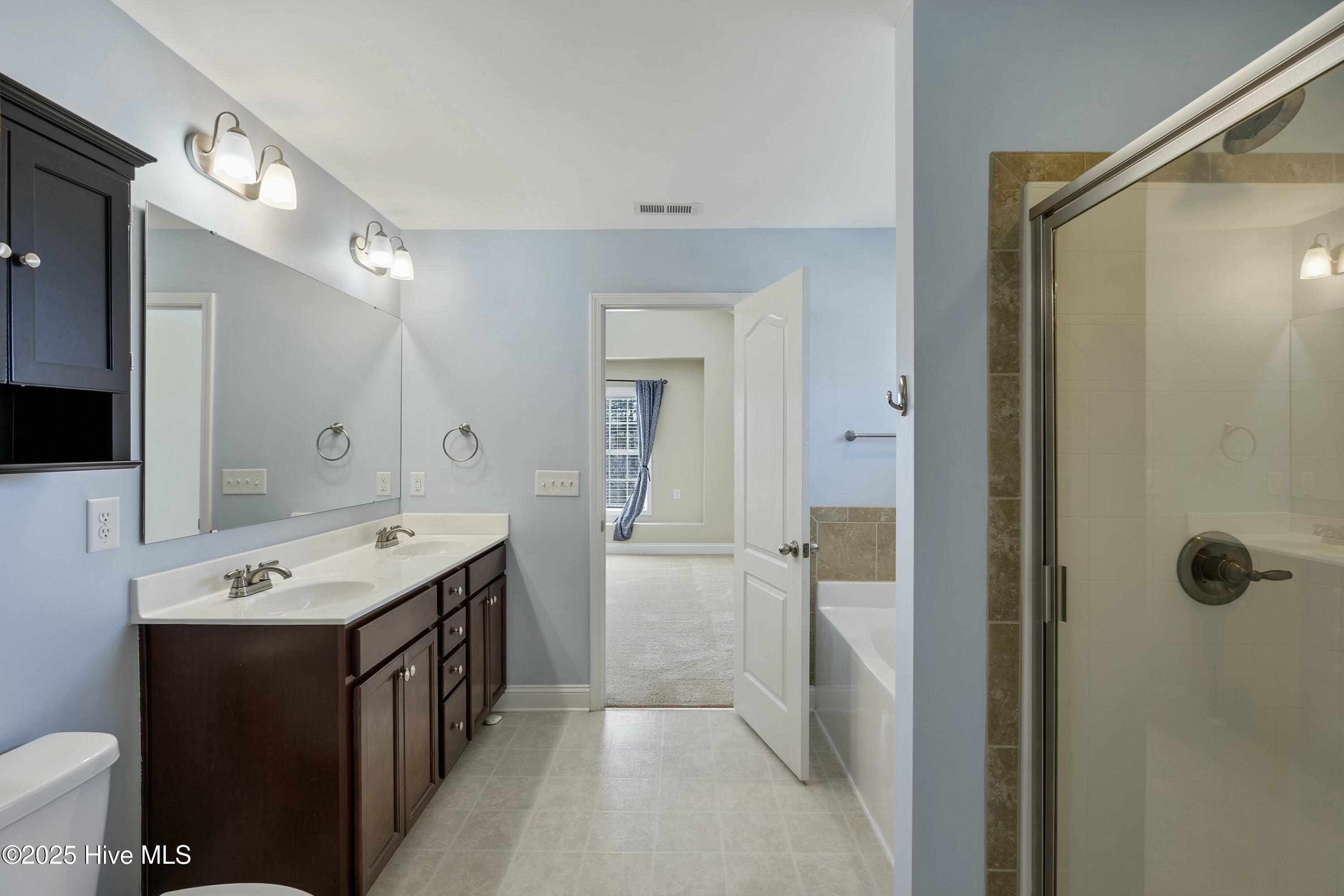 223 Samuel Nicholas Drive Cameron, NC 28326 - Photo 23 of 37 Master Bathroom