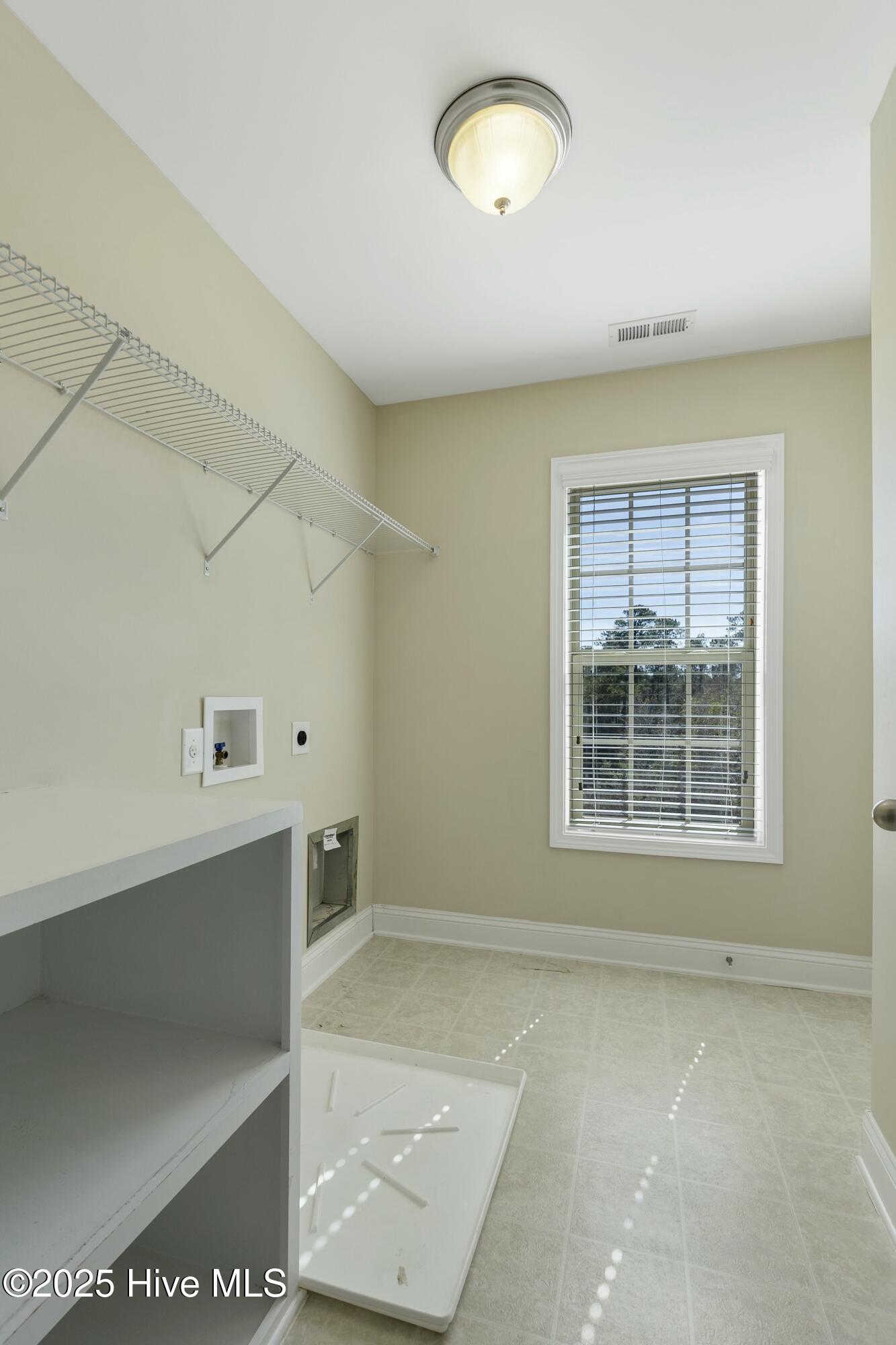 223 Samuel Nicholas Drive Cameron, NC 28326 - Photo 31 of 37 Laundry Room