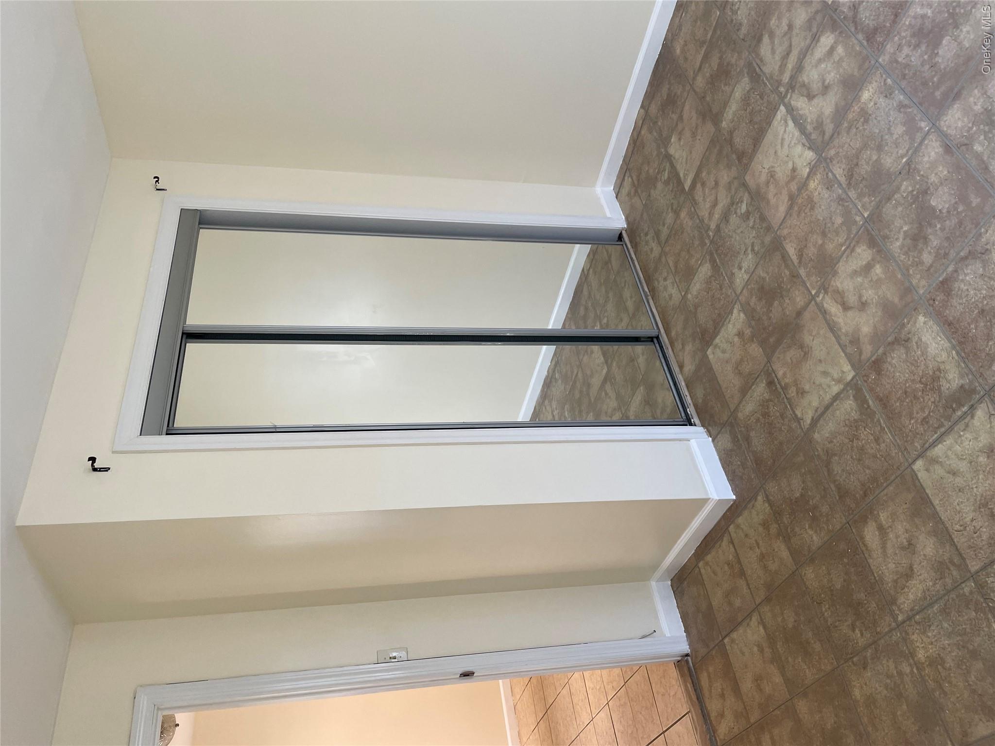 554 Long Beach Road Island Park, NY 11558 - Photo 5 of 10 Double Closet With Mirrored Sliding Doors