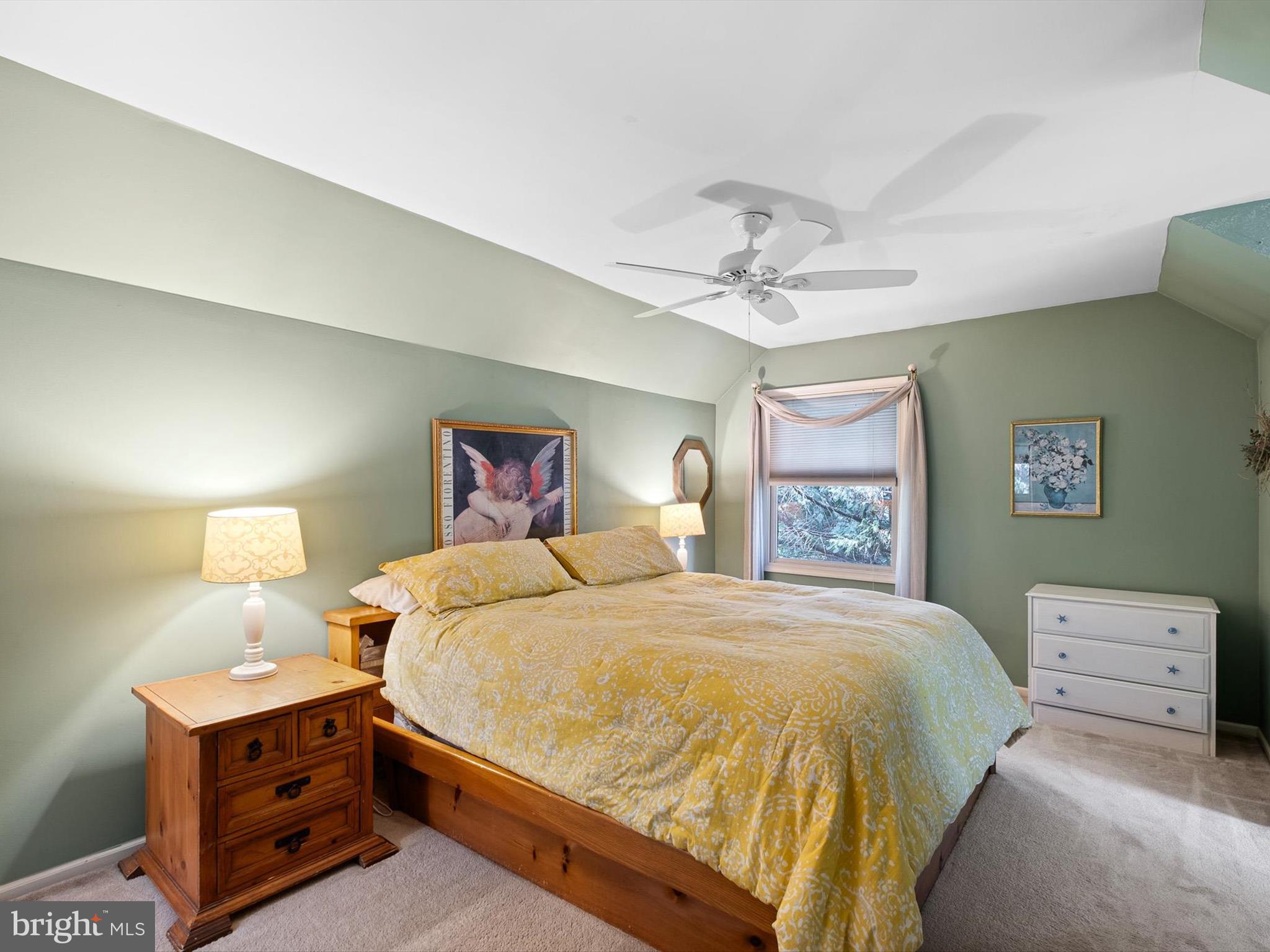 125 Hamilton Road Landenberg, PA 19350 - Photo 34 of 46 a spacious bedroom with a bed and a lamp on dresser