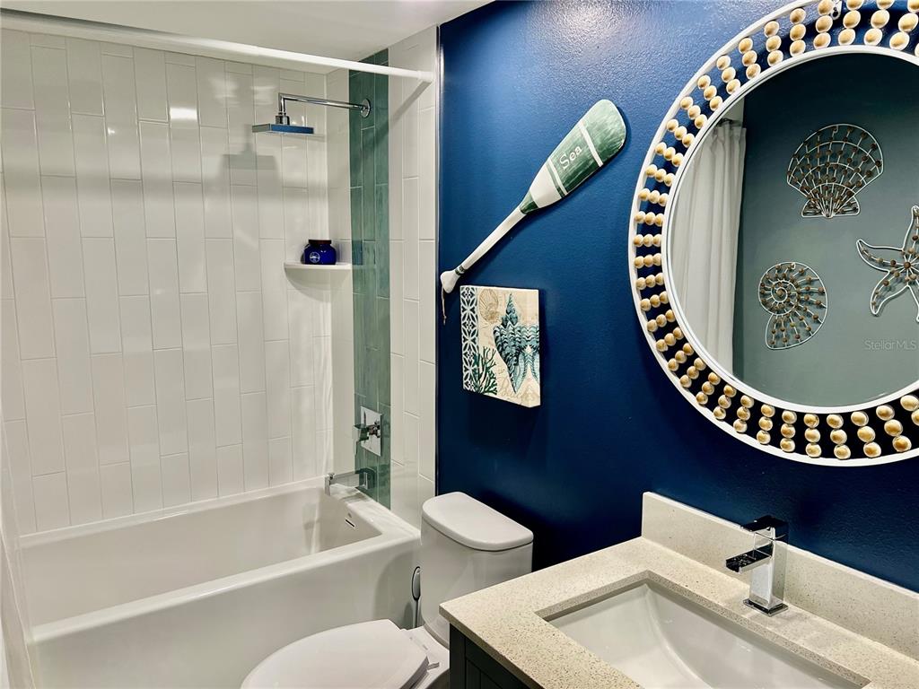 2150 Elm Street, Unit 605 Dunedin, FL 34698 - Photo 36 of 55 a bathroom with a bathtub and a toilet