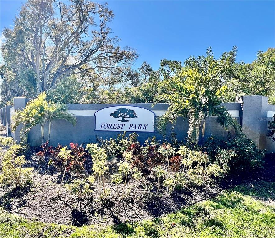 2150 Elm Street, Unit 605 Dunedin, FL 34698 - Photo 55 of 55 a front view of a house with a yard