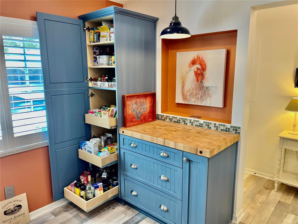 2150 Elm Street, Unit 605 Dunedin, FL 34698 - Photo 10 of 55 a room with toys and storage area