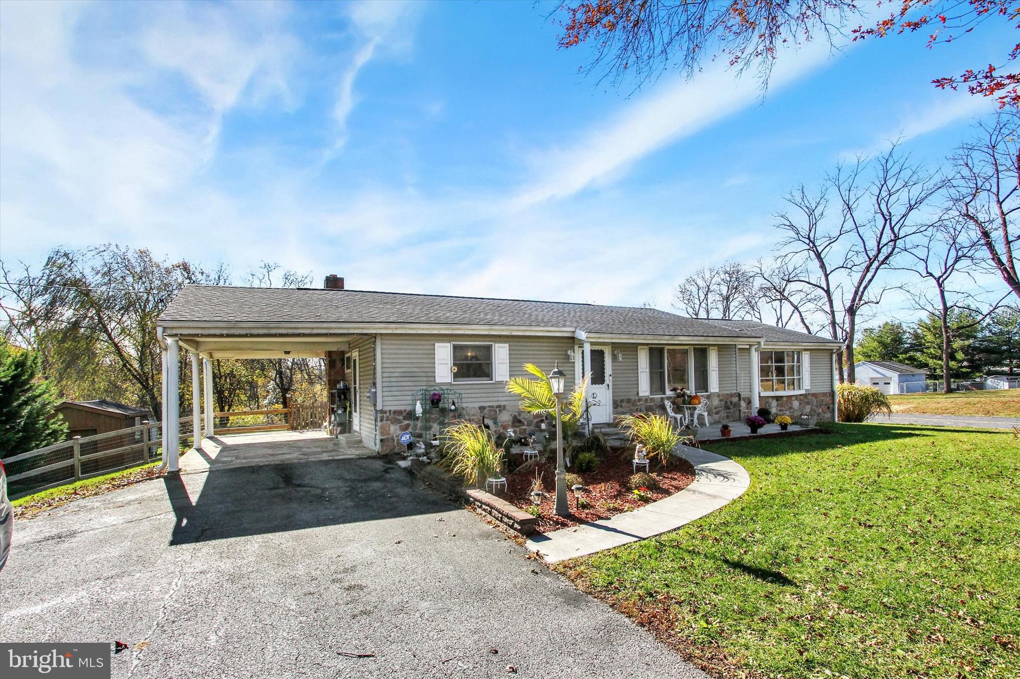 1365 Hanover Road Gettysburg, PA 17325 - Photo 2 of 26 front view of a house with a yard