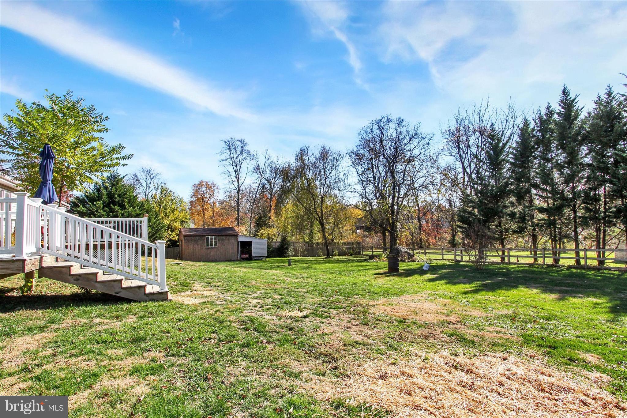 1365 Hanover Road Gettysburg, PA 17325 - Photo 22 of 26 a view of a deck with a big yard and plants