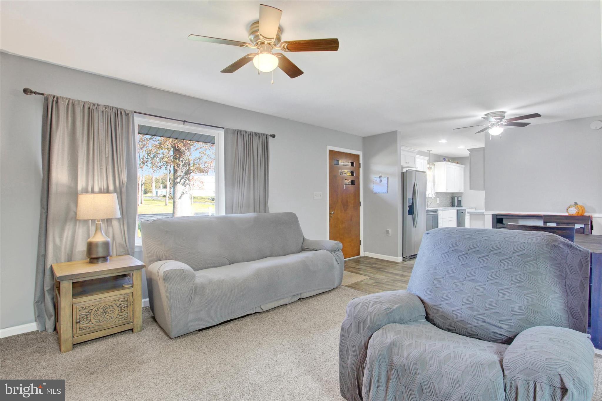 1365 Hanover Road Gettysburg, PA 17325 - Photo 4 of 26 a living room with furniture and a large window