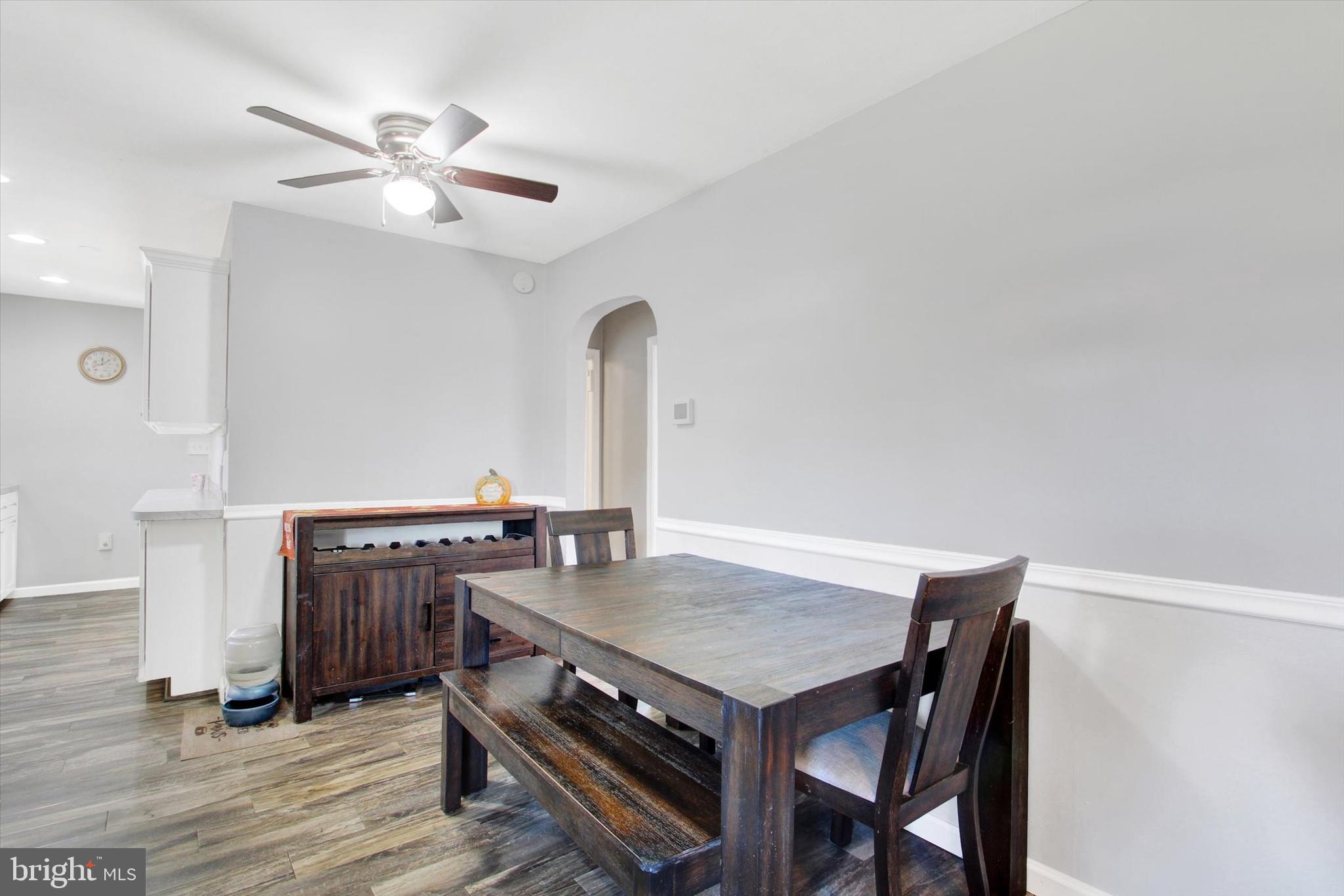 1365 Hanover Road Gettysburg, PA 17325 - Photo 5 of 26 a view of a dining room with furniture and wooden floor