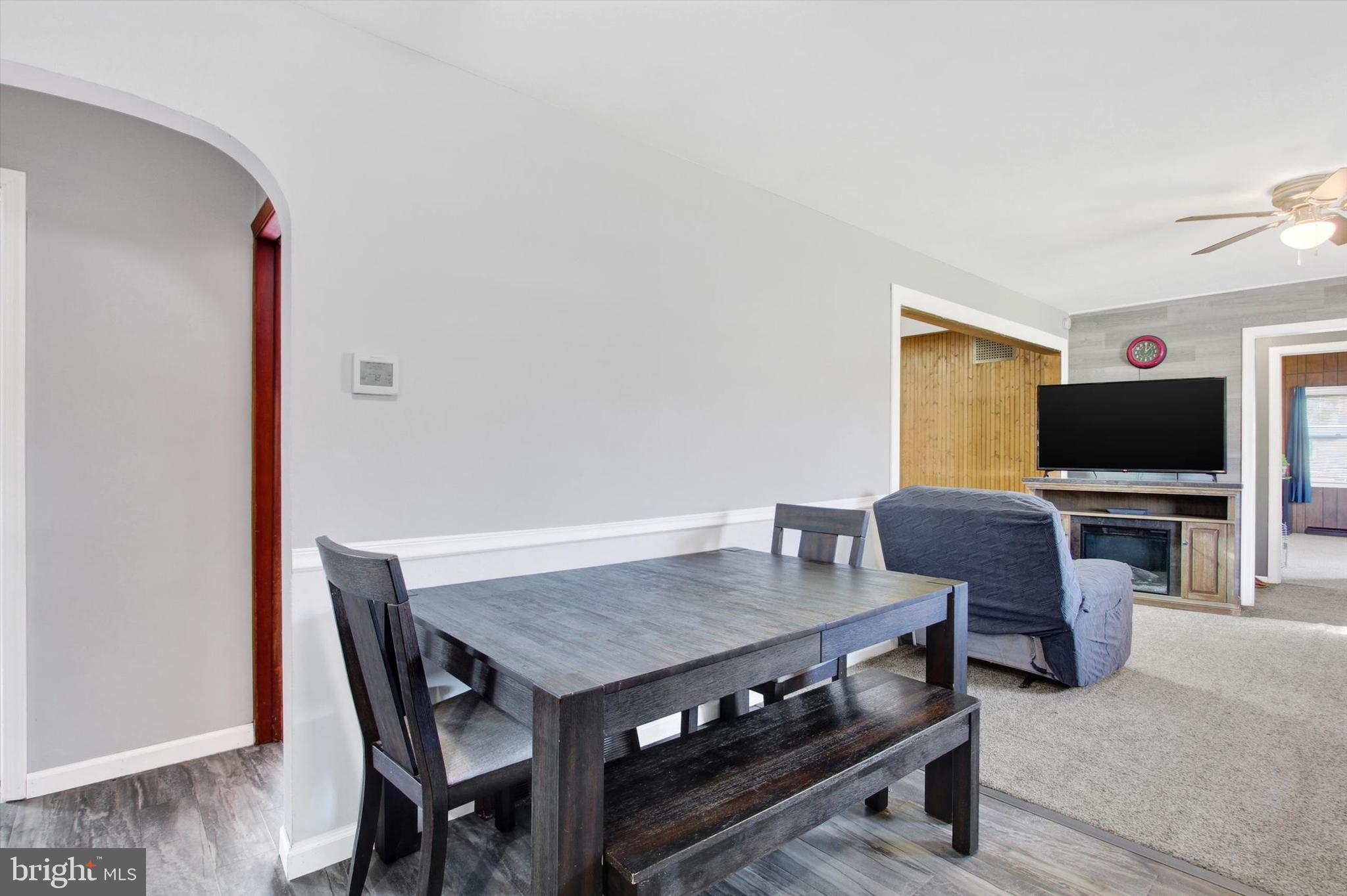 1365 Hanover Road Gettysburg, PA 17325 - Photo 6 of 26 a view of a dining room with furniture and wooden floor