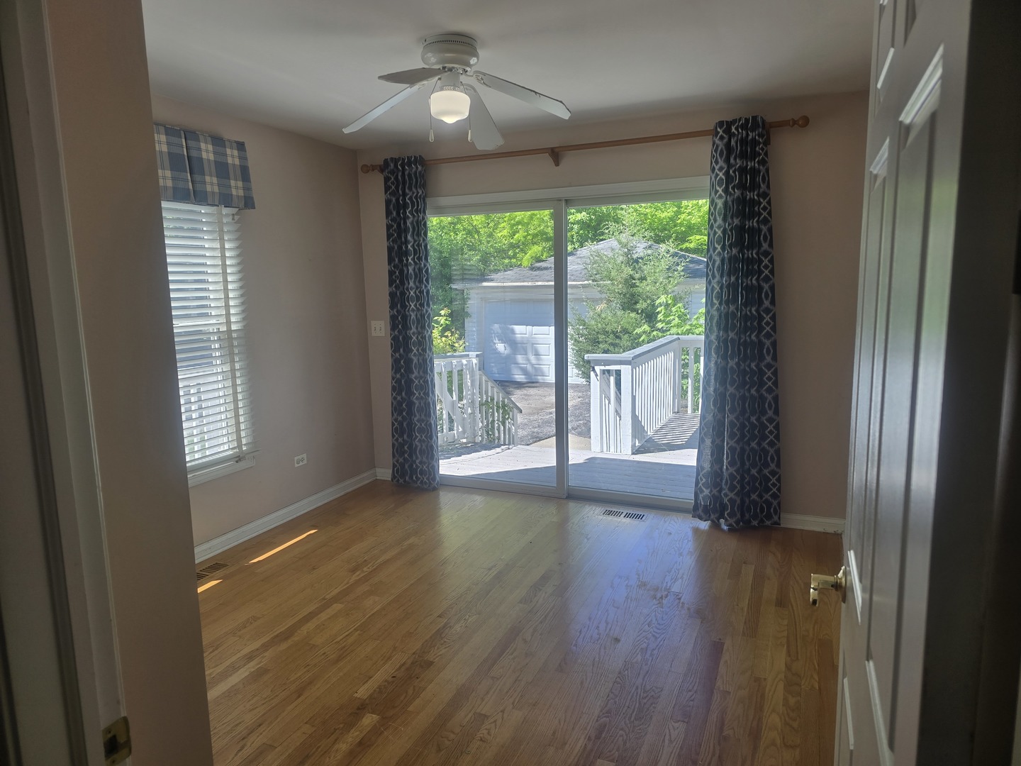 312 Nuttall Road Riverside, IL 60546 - Photo 11 of 35 an empty room with wooden floor and windows