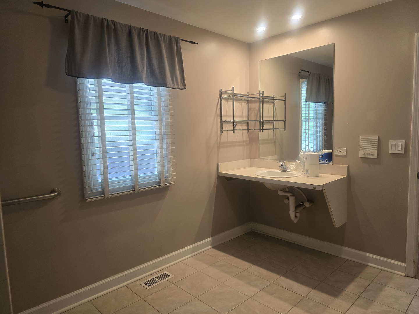312 Nuttall Road Riverside, IL 60546 - Photo 14 of 35 a bathroom with a sink and a mirror
