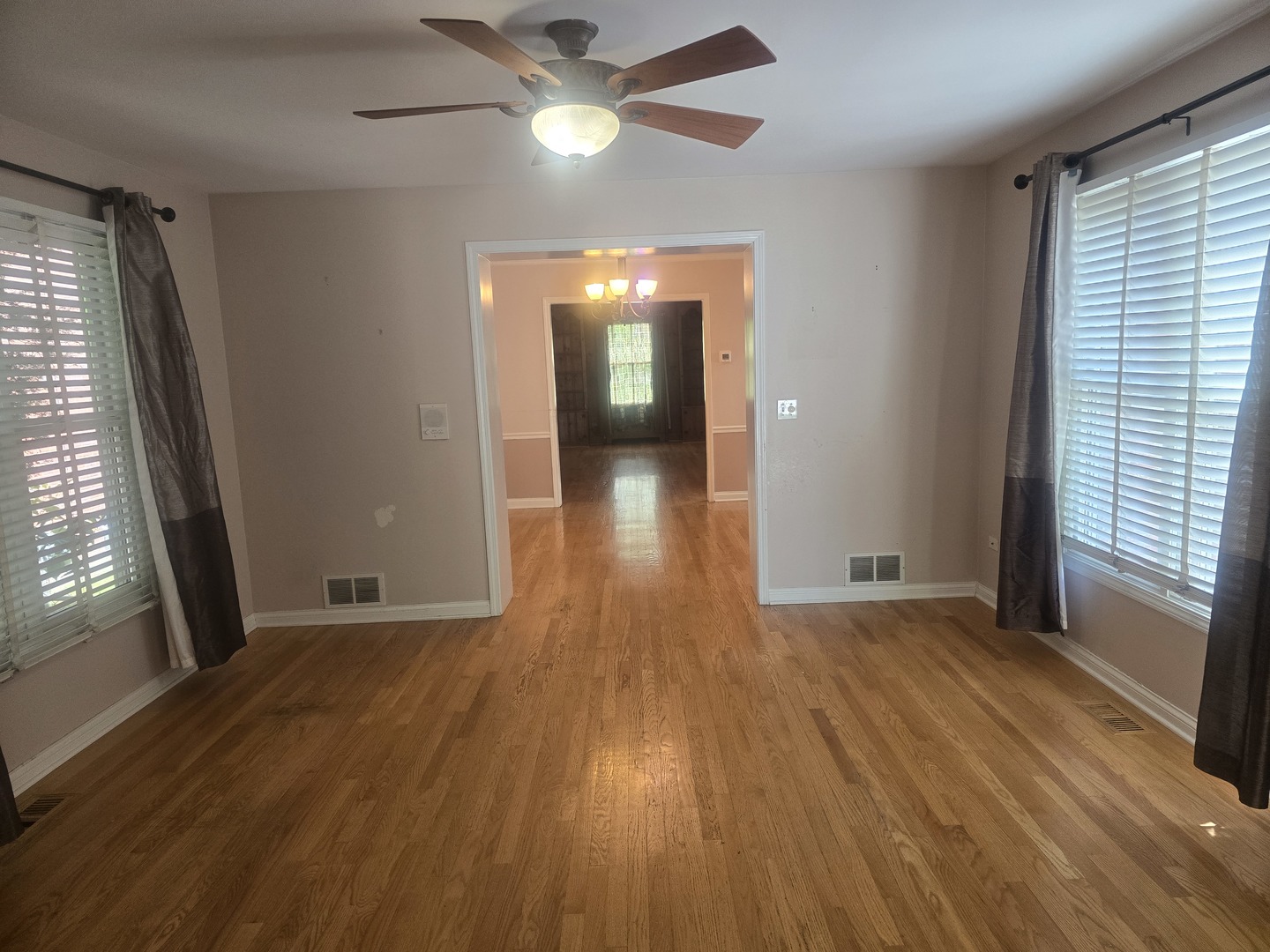 312 Nuttall Road Riverside, IL 60546 - Photo 15 of 35 wooden floor in an empty room with a window