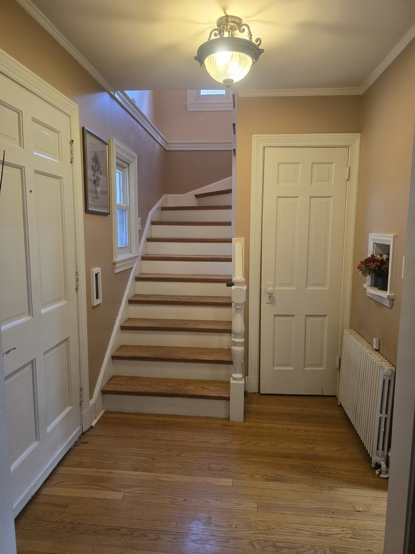 312 Nuttall Road Riverside, IL 60546 - Photo 2 of 35 a view of entryway and hall with wooden floor