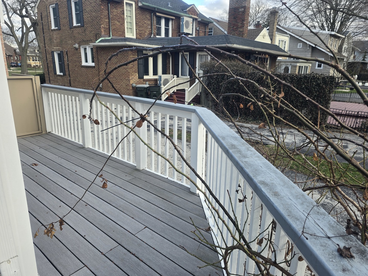312 Nuttall Road Riverside, IL 60546 - Photo 33 of 35 a view of balcony with wooden floor and fence and a bench