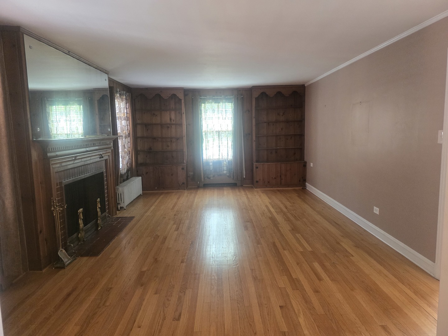 312 Nuttall Road Riverside, IL 60546 - Photo 4 of 35 wooden floor in an empty room with a window