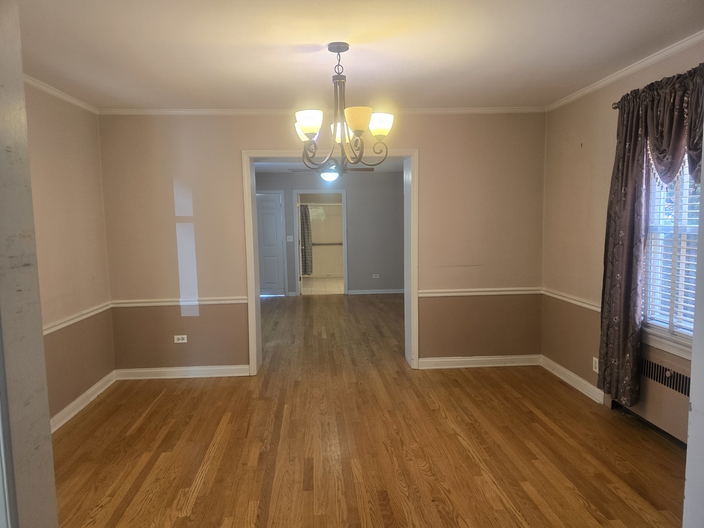 312 Nuttall Road Riverside, IL 60546 - Photo 8 of 35 wooden floor in an empty room with a window