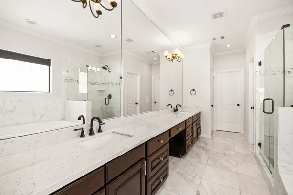 a bathroom with a bathtub and shower