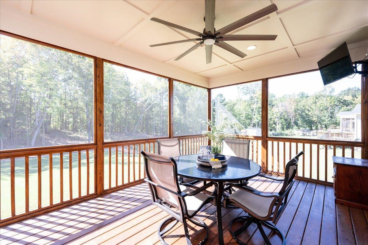 7108 Rex Road Holly Springs, NC 27540 - Photo 10 of 38 What a great space to relax, enjoy time with family and friends, or, if working from home, why not take the "office" outside? Screen porch