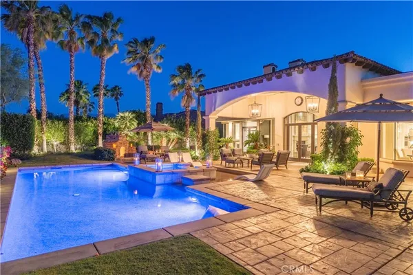 a view of a patio with swimming pool