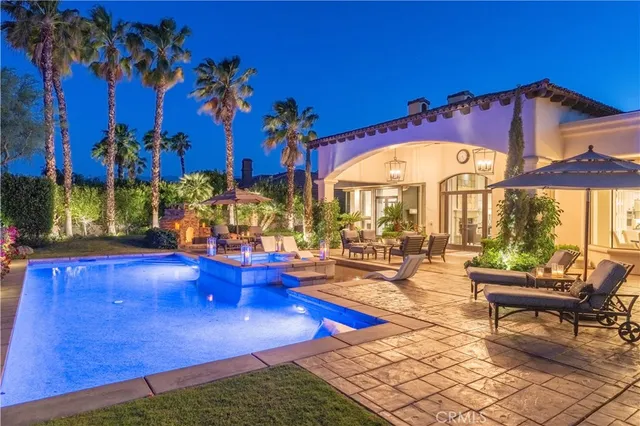 a view of a patio with swimming pool