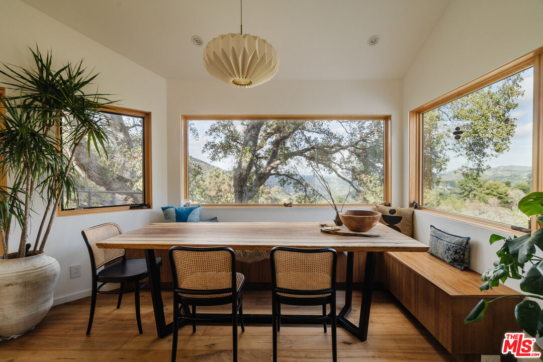 2002 Tuna Canyon Road Topanga, CA 90290 - Photo 20 of 70 a view of a dining room with furniture window and outside view